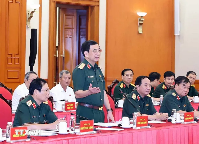 Bộ Chính trị làm việc với Ban Thường vụ Quân ủy Trung ương  - Ảnh 1.