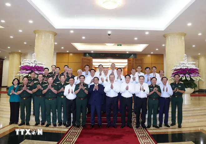 Bộ Chính trị làm việc với Ban Thường vụ Quân ủy Trung ương  - Ảnh 2.