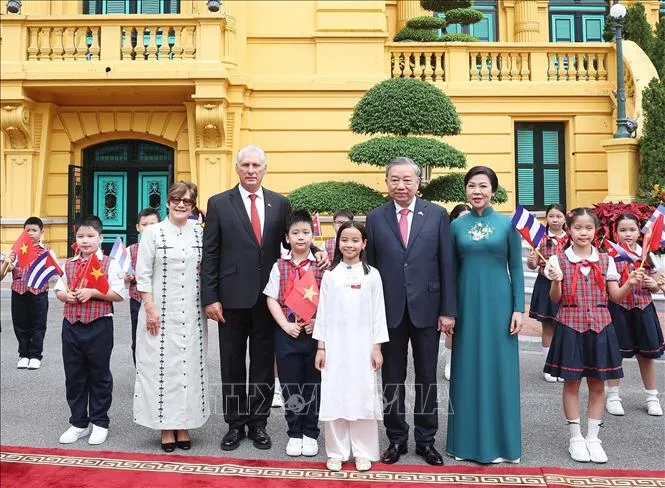 Lễ đón chính thức Bí thư thứ Nhất Đảng Cộng sản, Chủ tịch nước Cộng hòa Cuba- Ảnh 3. Lễ đón chính thức Bí thư thứ Nhất Đảng Cộng sản, Chủ tịch nước Cộng hòa Cuba- Ảnh 3.