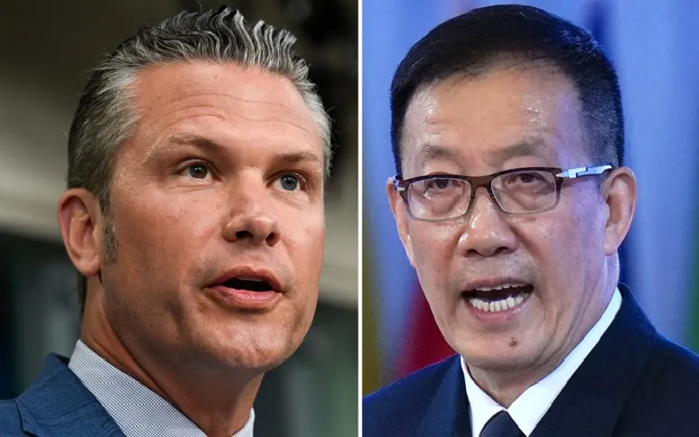 Bộ trưởng Bộ Chiến tranh Mỹ Pete Hegseth (trái) và Bộ trưởng Bộ Quốc phòng Trung Quốc Đổng Tuấn (Ảnh: Handout)