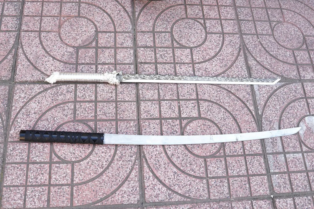 Khởi tố 8 đối tượng mang hung khí, đuổi đánh nhau trên đường phố Nghệ An  - Ảnh 3.