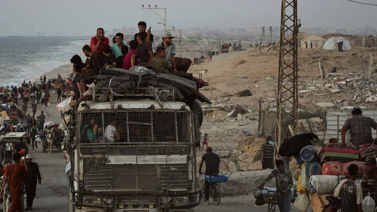 Israel mở tuyến đường mới ra khỏi thành phố Gaza khi số người chết vượt quá 65.000 - Ảnh 2. Israel mở tuyến đường mới ra khỏi thành phố Gaza khi số người chết vượt quá 65.000 - Ảnh 2.