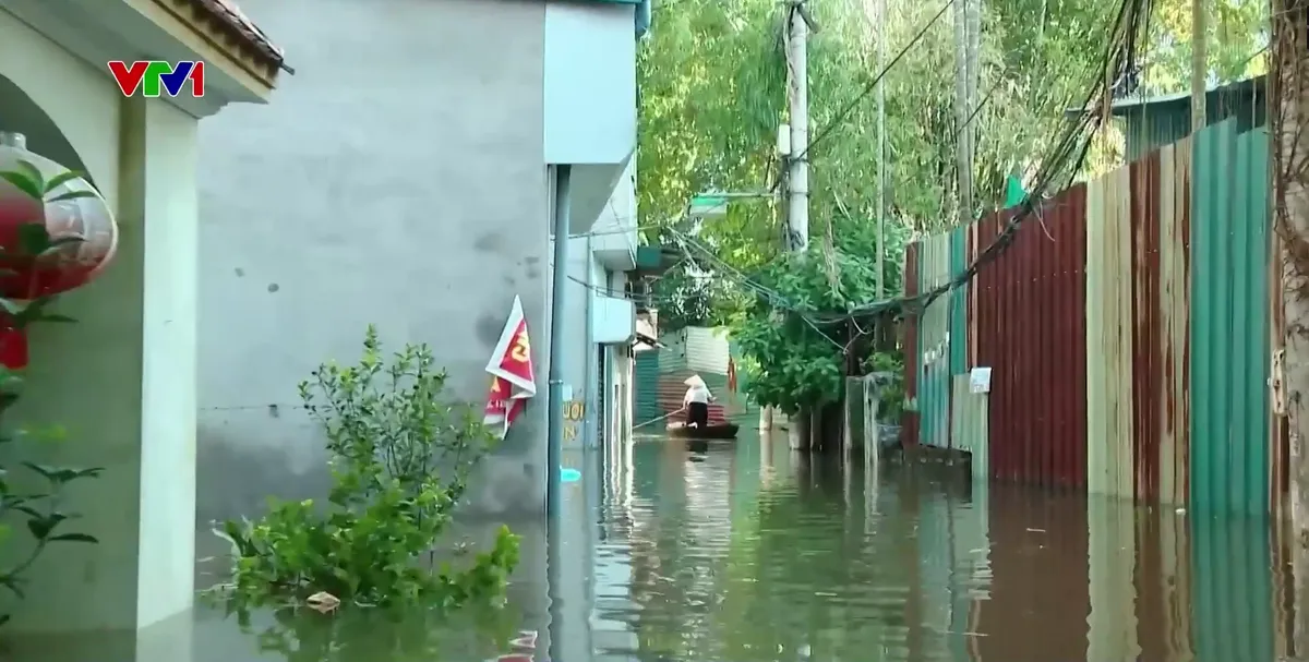 Cuộc sống người dân khó khăn ở vùng ngập của Thủ đô - Ảnh 2.