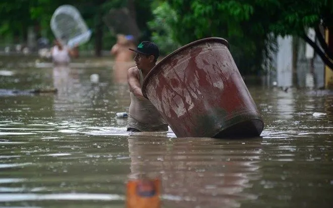 Mưa lớn gây ngập lụt, sạt lở ở Mexico. (Ảnh: AFP) Mưa lớn gây ngập lụt, sạt lở ở Mexico. (Ảnh: AFP)