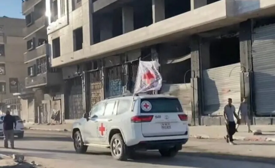Hamas trao trả thêm 2 thi thể con tin cho Israel  - Ảnh 1.