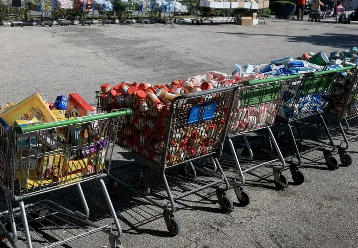 Trợ cấp thực phẩm bị tạm ngừng, kinh tế Mỹ có nguy cơ giảm tốc ngắn hạn - Ảnh 1.