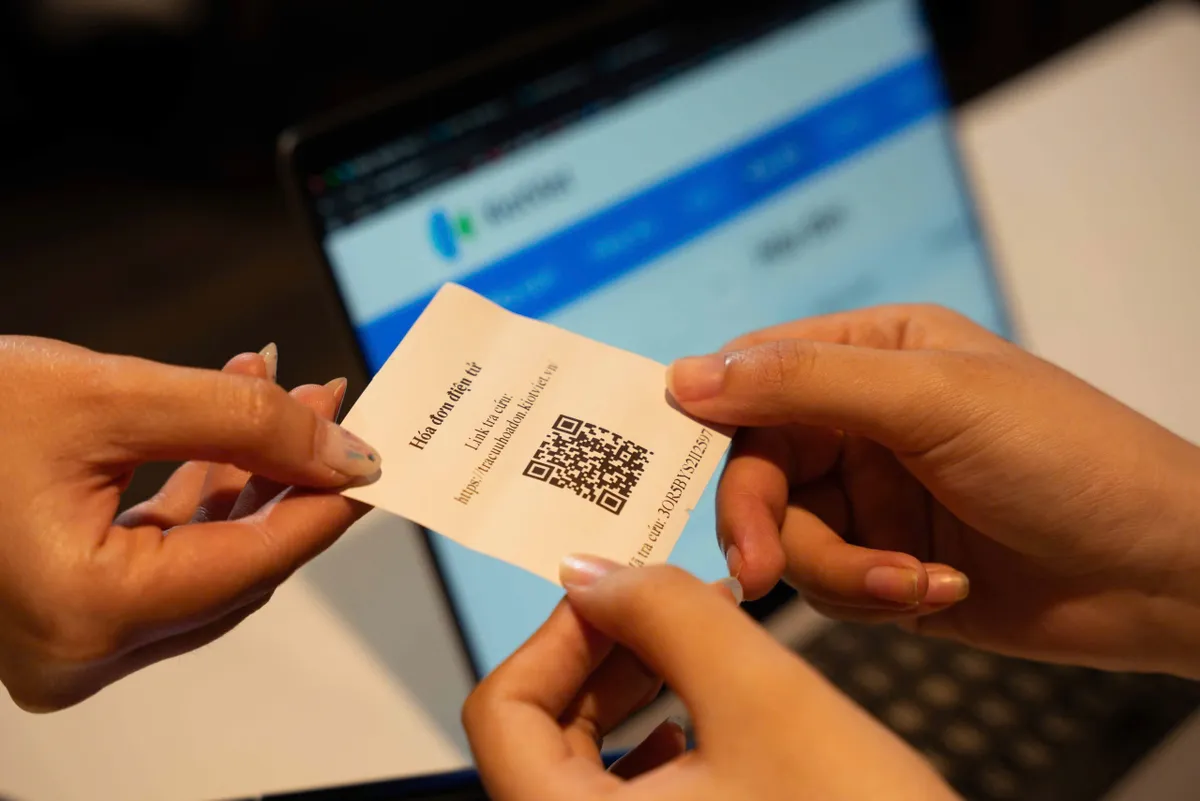 Hỗ trợ hộ kinh doanh theo thuế khoán chuyển sang kê khai thuế - Ảnh 1.