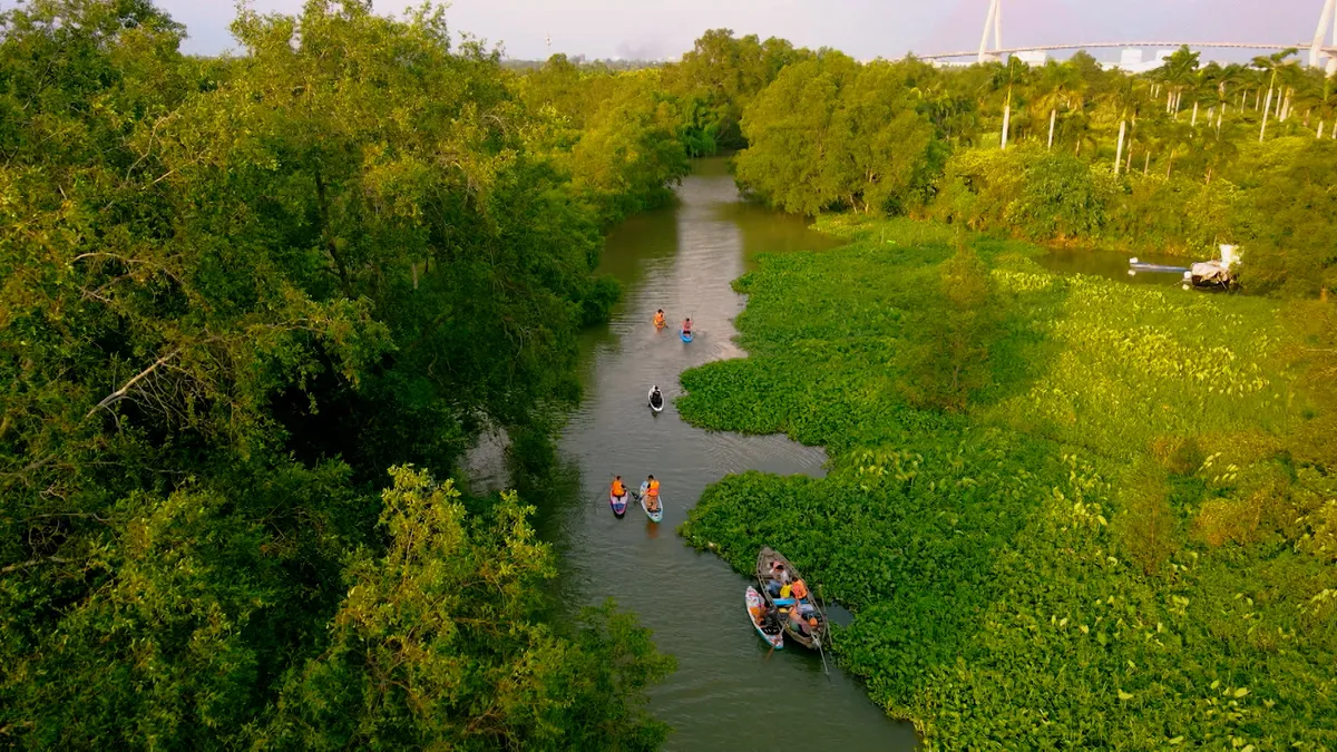 Năng lượng mới từ những mái chèo SUP trên sông Hậu - Ảnh 2.