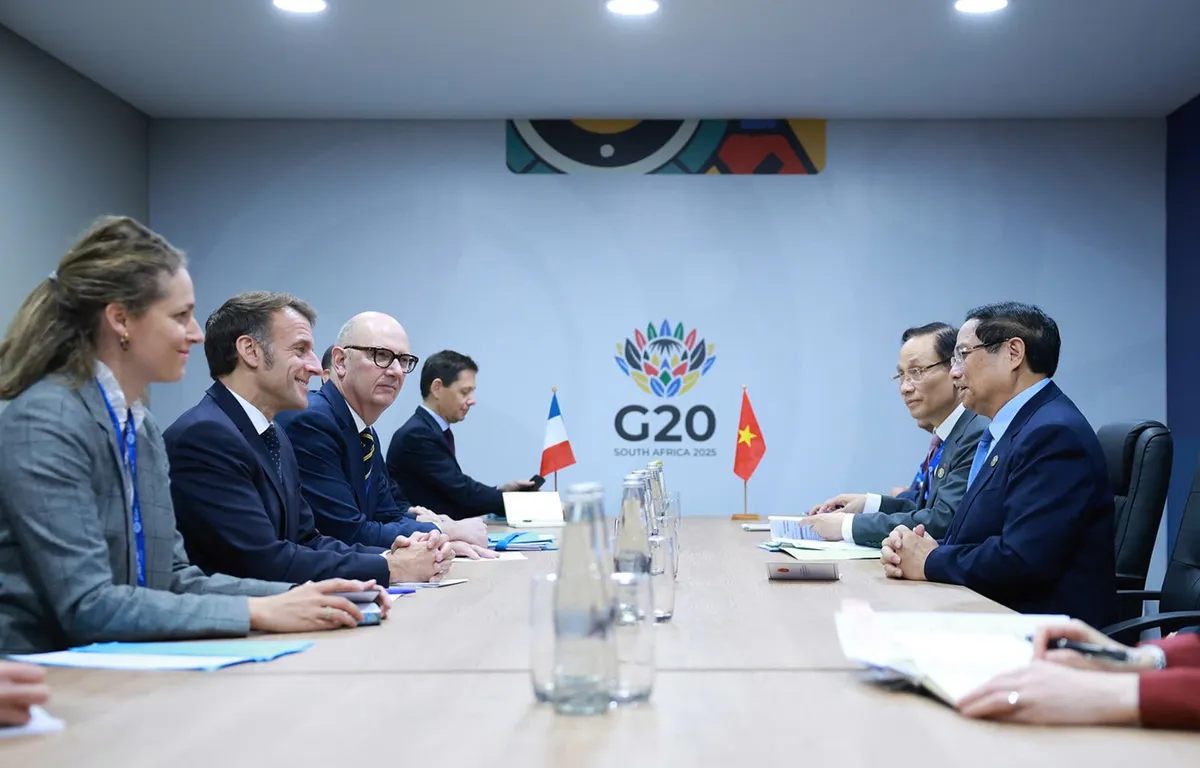 Thủ tướng Phạm Minh Chính gặp Tổng thống Pháp và Tổng Thư ký OECD nhân Hội nghị G20 - Ảnh 1.
