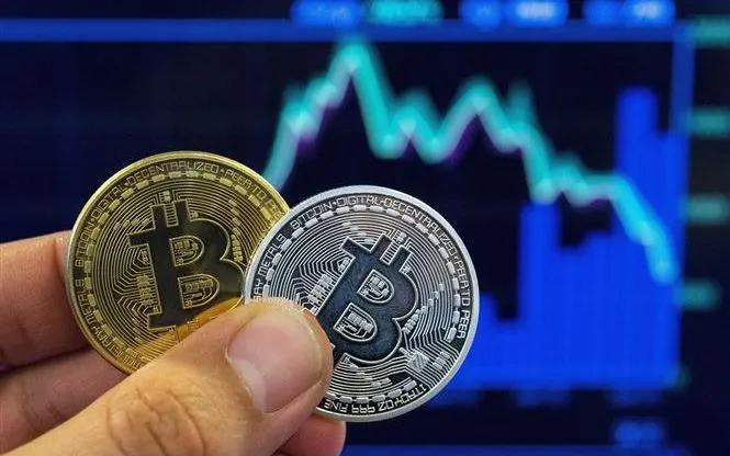 Hình ảnh mô phỏng đồng tiền điện tử Bitcoin. Ảnh: AFP/TTXVN