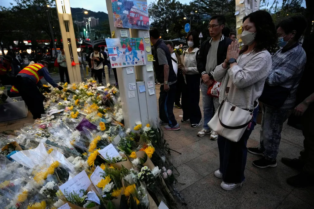 Tiếp tục tìm thấy nhiều thi thể trong vụ cháy chung cư tại Hong Kong (Trung Quốc) - Ảnh 3.