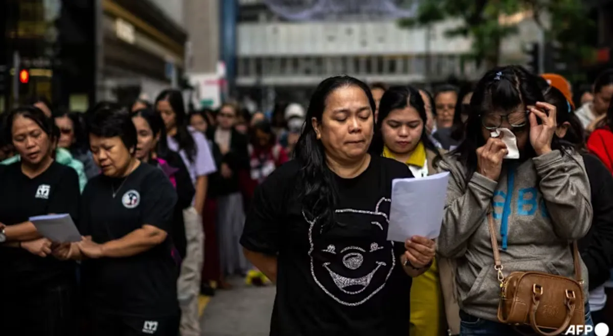 Lao động nhập cư tìm kiếm sự hỗ trợ sau thảm kịch cháy chung cư tại Hong Kong (Trung Quốc)- Ảnh 2.