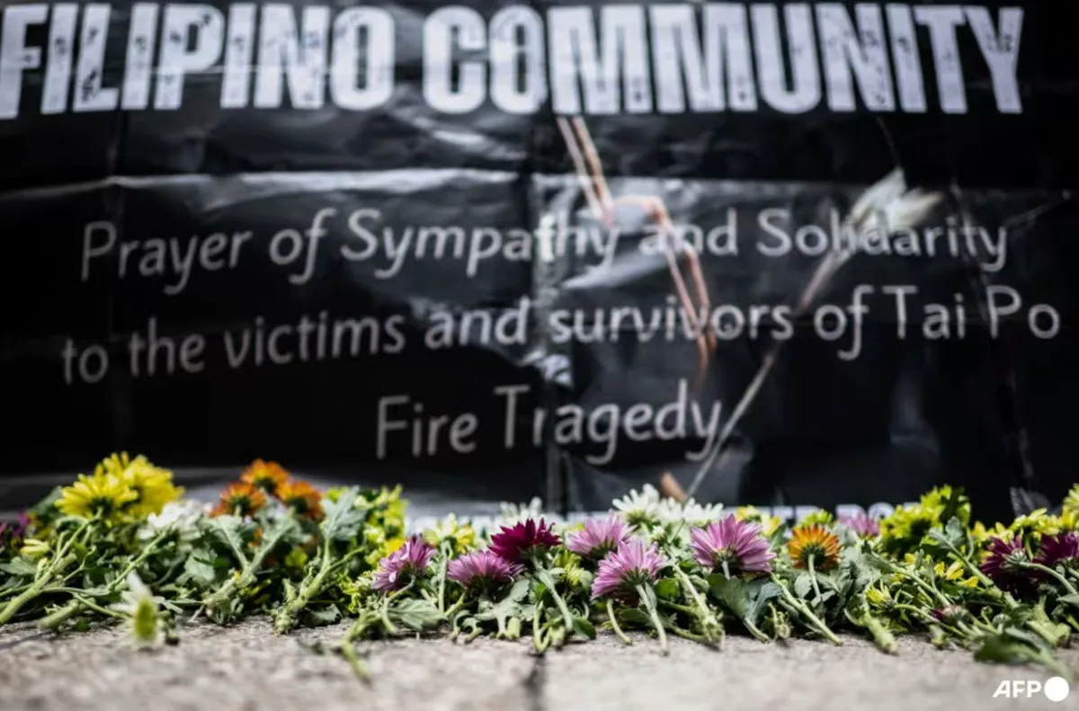 Lao động nhập cư tìm kiếm sự hỗ trợ sau thảm kịch cháy chung cư tại Hong Kong (Trung Quốc)- Ảnh 1.