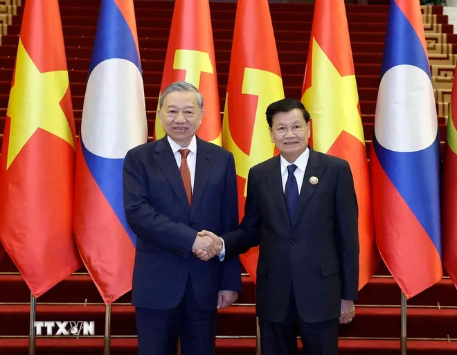 Cuộc gặp cấp cao giữa Đảng Cộng sản Việt Nam và Đảng Nhân dân Cách mạng Lào- Ảnh 1.