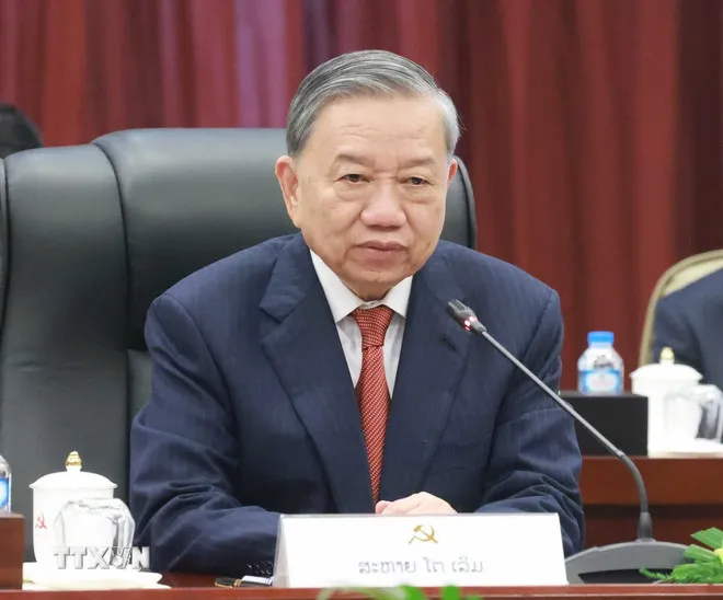 Cuộc gặp cấp cao giữa Đảng Cộng sản Việt Nam và Đảng Nhân dân Cách mạng Lào- Ảnh 2.