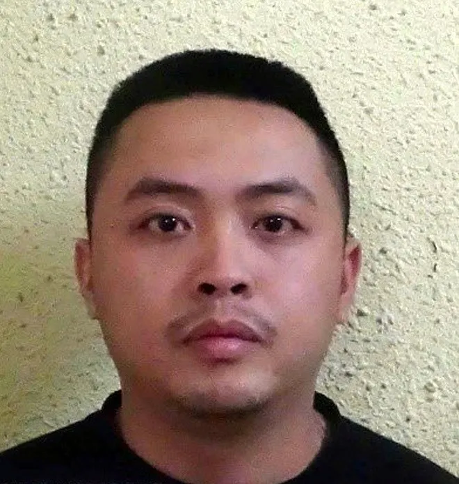 Tạm giữ tài xế đánh người sau va chạm giao thông ở Hà Nội - Ảnh 1.