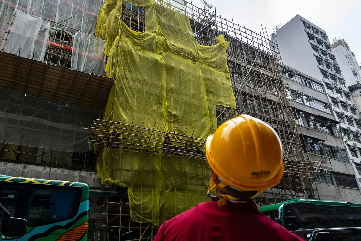 Hong Kong (Trung Quốc) bỏ toàn bộ lưới giàn giáo tại các công trình - Ảnh 1.