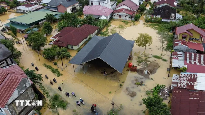 Thiệt hại kinh tế khổng lồ do mưa lũ tại châu Á - Ảnh 1.