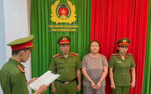 Đỗ Hồng Trinh tại cơ quan công an.