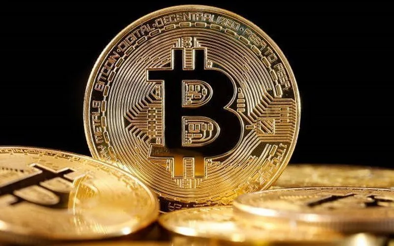 Đồng tiền kỹ thuật số bitcoin. (Ảnh: Getty Images/TTXVN)