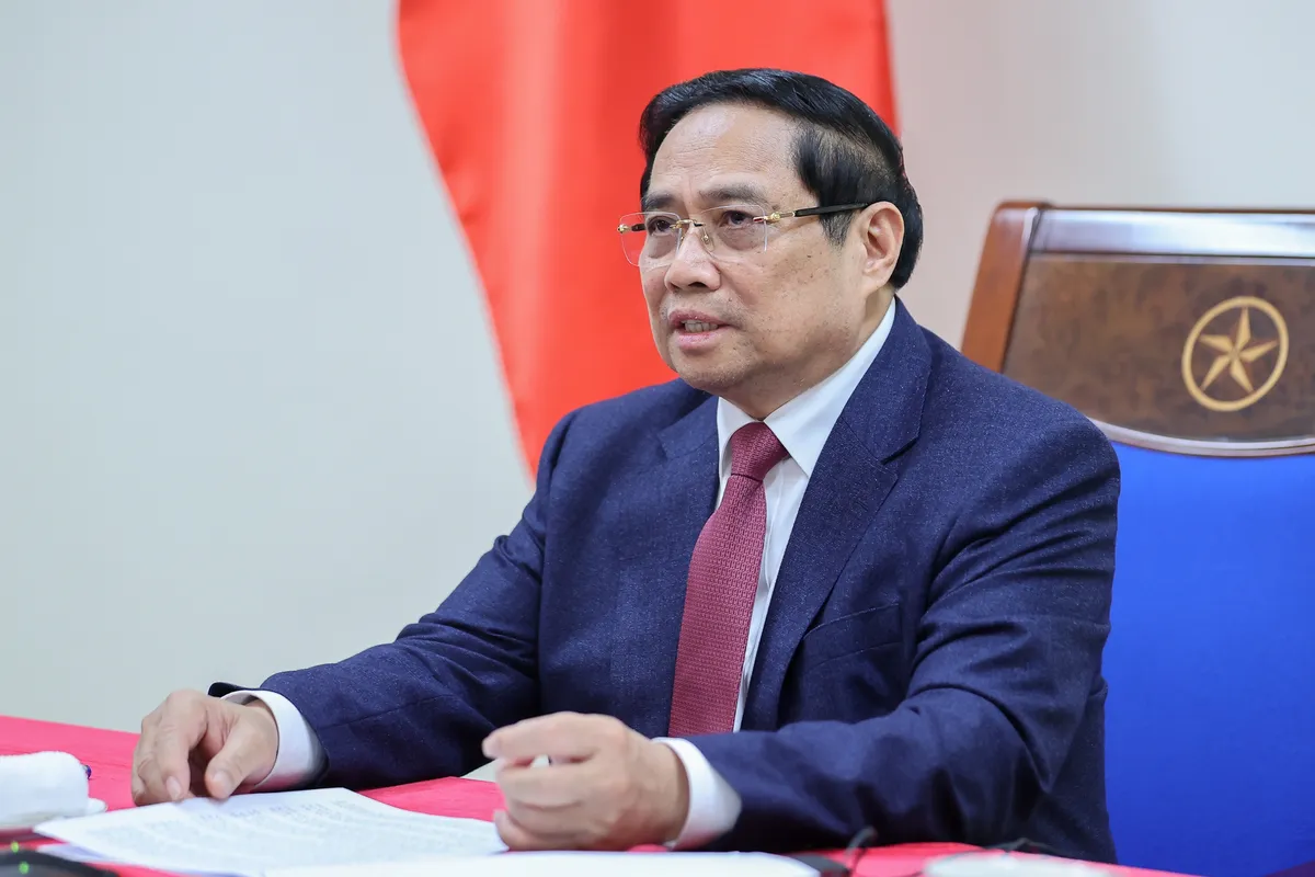 Thủ tướng Phạm Minh Ch&iacute;nh điện đ&agrave;m với Thủ tướng Singapore Lawrence Wong - Ảnh 3.