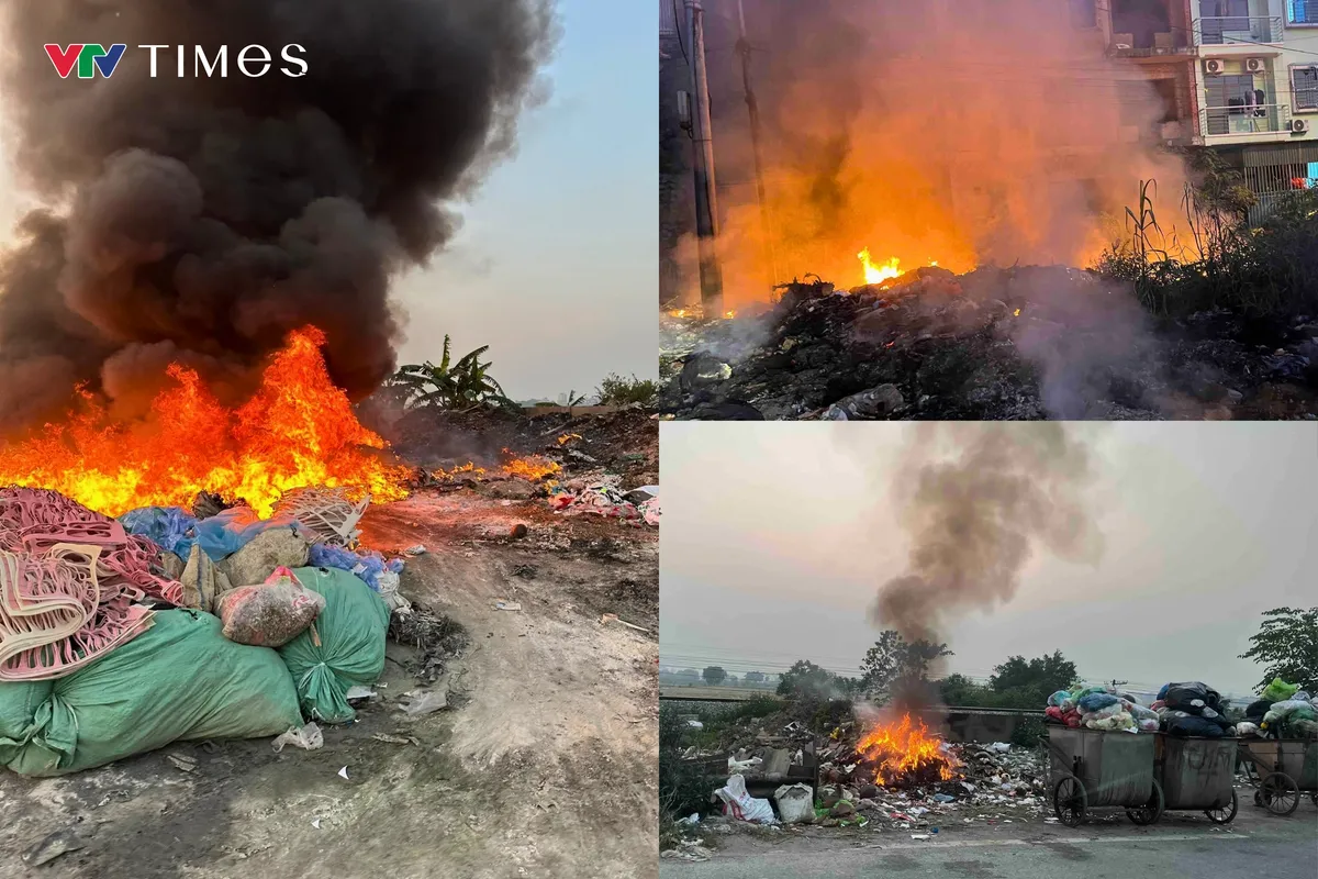 Đốt r&aacute;c giữa phố, kh&oacute;i phủ khắp bầu trời H&agrave; Nội - Ảnh 1.