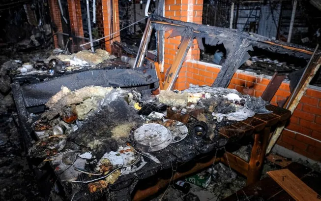 Quán cafe tại tỉnh Kherson bị hư hại trong đêm giao thừa. Ảnh: Sputnik