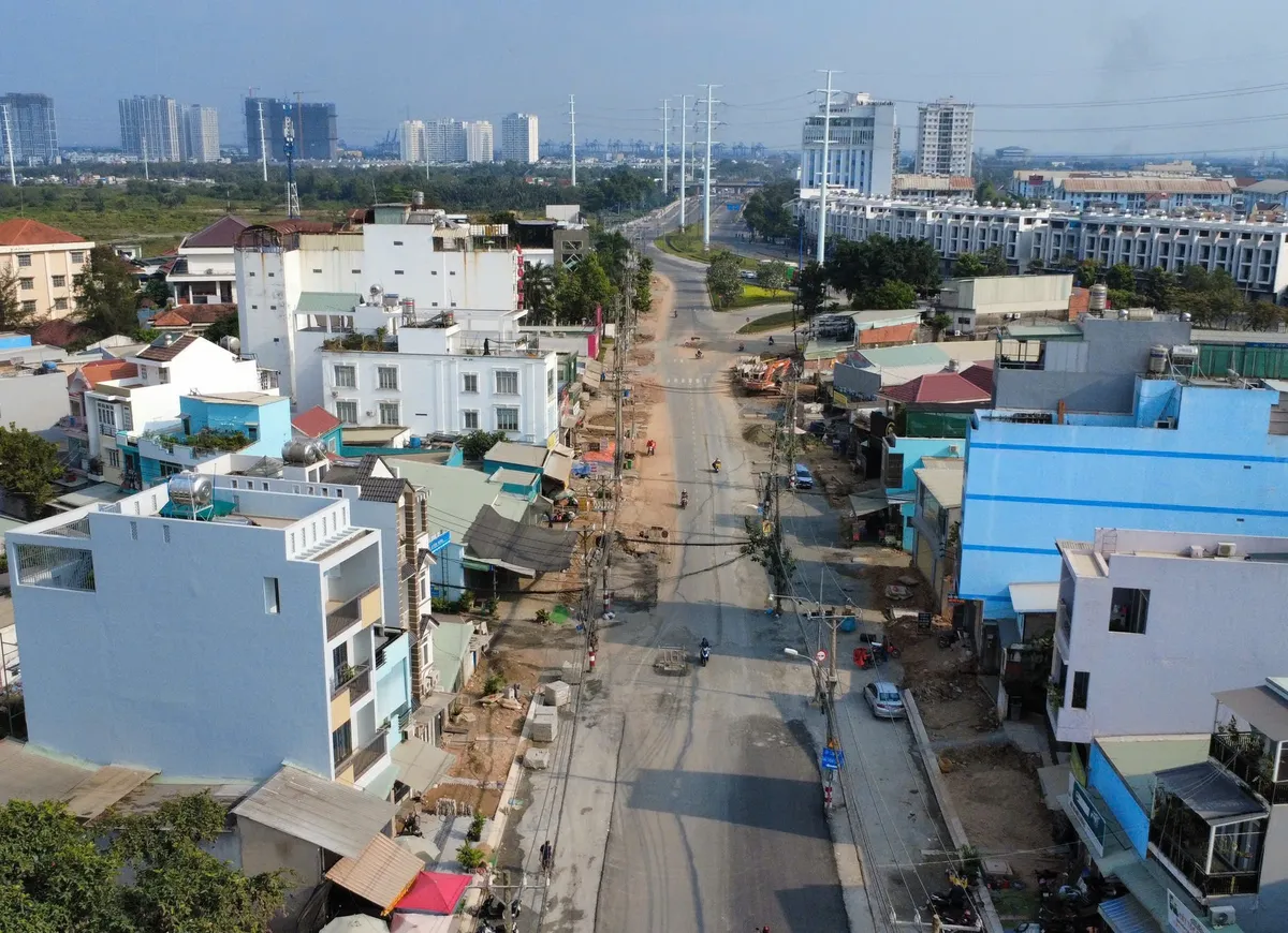 Dự &aacute;n mở rộng đường Nguyễn Thị Định: Thi c&ocirc;ng xuy&ecirc;n Tết để sớm x&oacute;a "điểm đen" &ugrave;n tắc ph&iacute;a Đ&ocirc;ng- Ảnh 1.