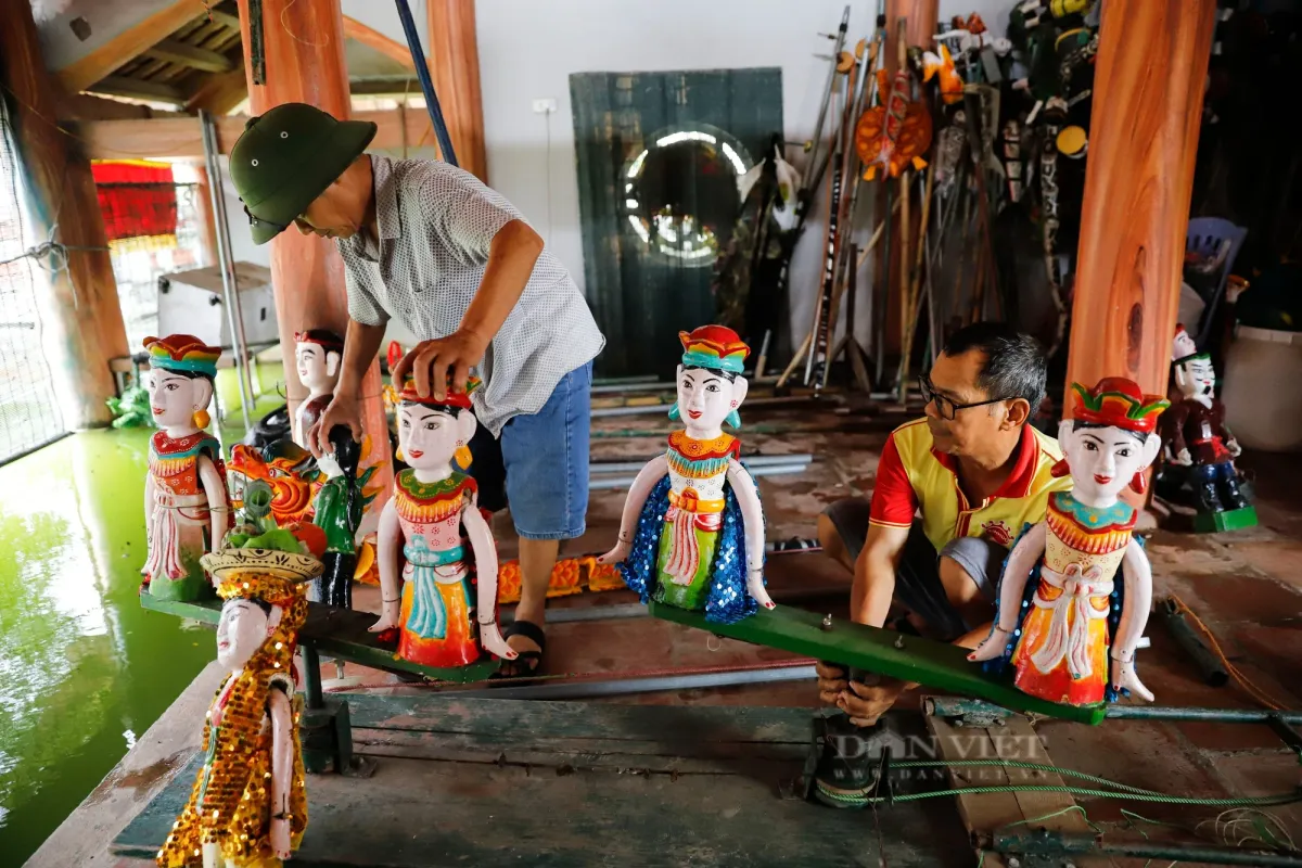 Múa rối nước: Vũ điệu huyền ảo trên mặt nước đình làng- Ảnh 2. Múa rối nước: Vũ điệu huyền ảo trên mặt nước đình làng- Ảnh 2.