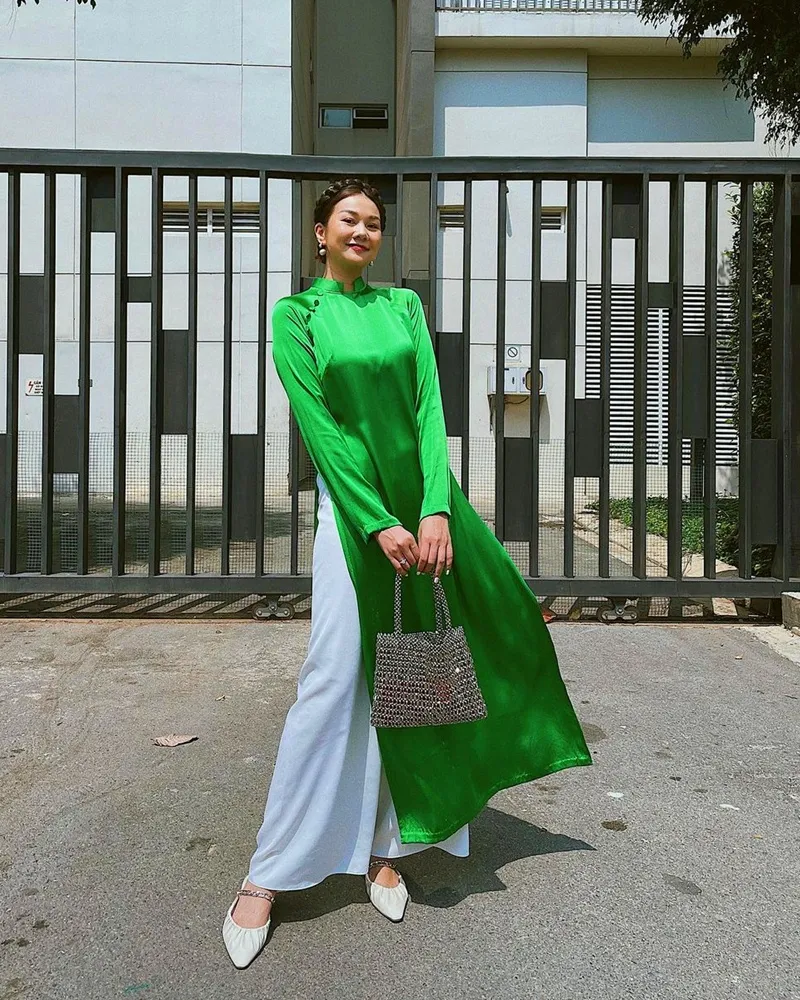 &Aacute;o d&agrave;i Tết 2026: Cuộc đổ bộ của chất liệu d&acirc;n gian v&agrave; xu hướng t&ocirc;n vinh bản sắc- Ảnh 1.