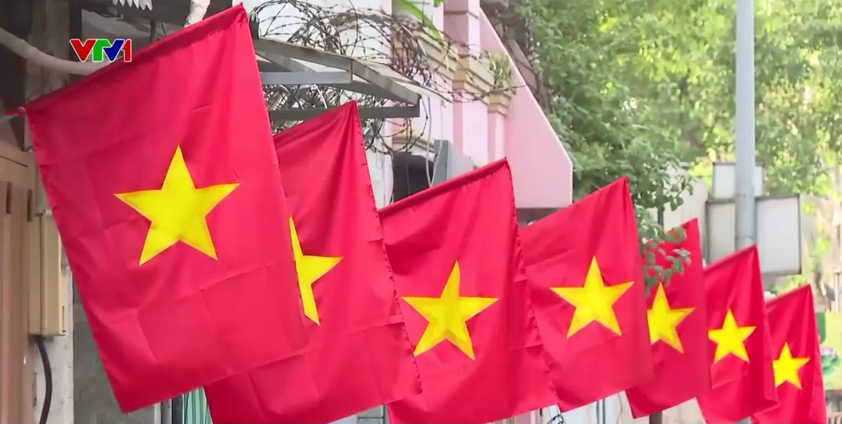 TP Hồ Ch&iacute; Minh cờ hoa rực rỡ ch&agrave;o mừng Đại hội XIV của Đảng - Ảnh 1.