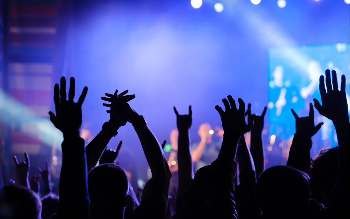 Các sự kiện âm nhạc với cường độ âm thanh lớn tiềm ẩn nguy cơ gây hại cho thính lực. Ảnh minh họa: Getty Images