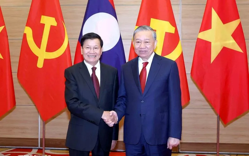 Tổng Bí thư Tô Lâm và Tổng Bí thư, Chủ tịch nước Lào Thongloun Sisoulith. (Ảnh: TTXVN)