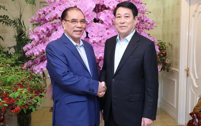 Chủ tịch nước Lương Cường ch&uacute;c Tết nguy&ecirc;n Tổng B&iacute; thư N&ocirc;ng Đức Mạnh - Ảnh 1.