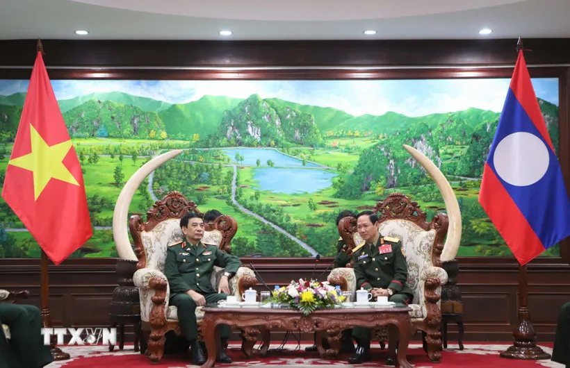 Việt Nam - L&agrave;o hợp t&aacute;c quốc ph&ograve;ng to&agrave;n diện, thực chất - Ảnh 1.