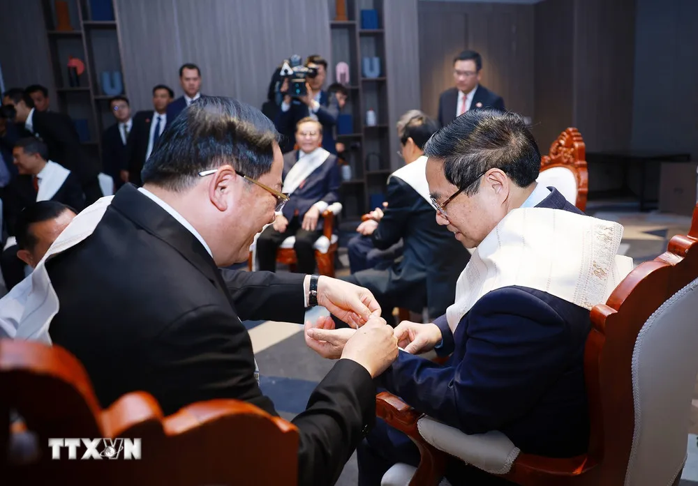 Tổng B&iacute; thư T&ocirc; L&acirc;m dự Lễ buộc chỉ cổ tay truyền thống của L&agrave;o - Ảnh 2.