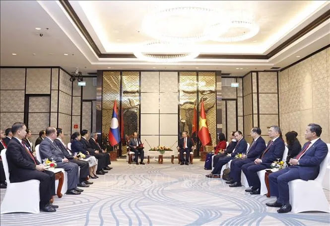 Tổng B&iacute; thư tiếp Chủ tịch Mặt trận L&agrave;o x&acirc;y dựng đất nước - Ảnh 2.