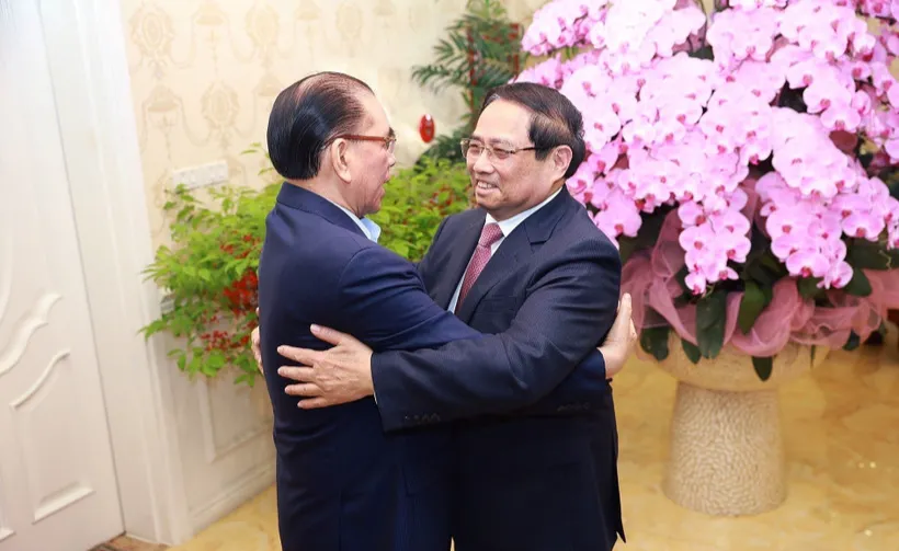 Thủ tướng Phạm Minh Ch&iacute;nh thăm, ch&uacute;c Tết nguy&ecirc;n Tổng B&iacute; thư N&ocirc;ng Đức Mạnh - Ảnh 1.