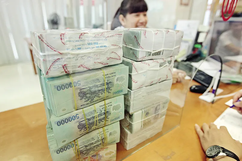 Thanh khoản bớt căng, lãi suất liên ngân hàng giảm mạnh từ 21% về còn 3,7%- Ảnh 1. Ngân hàng Nhà nước điều tiết thanh khoản