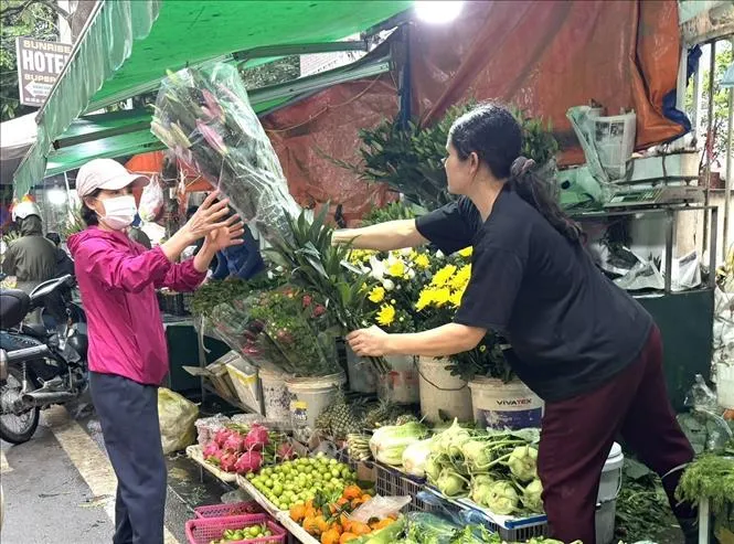 Thị trường Tết B&iacute;nh Ngọ kh&ocirc;ng khan h&agrave;ng, kh&ocirc;ng tăng gi&aacute; đột biến  - Ảnh 2.