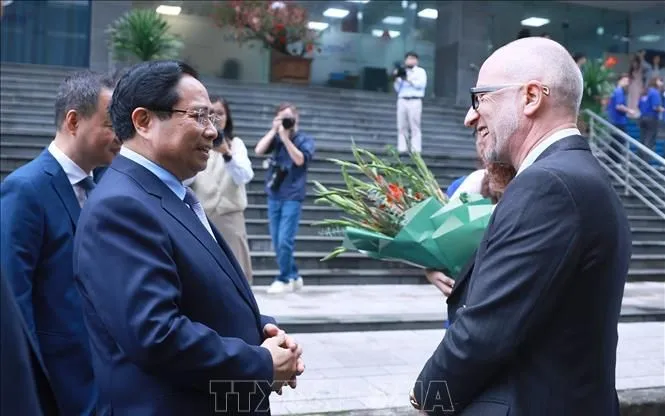 Thủ tướng Phạm Minh Chính đến thăm Viện Hàn lâm Khoa học và Công nghệ Việt Nam. Ảnh: Dương Giang/TTXVN