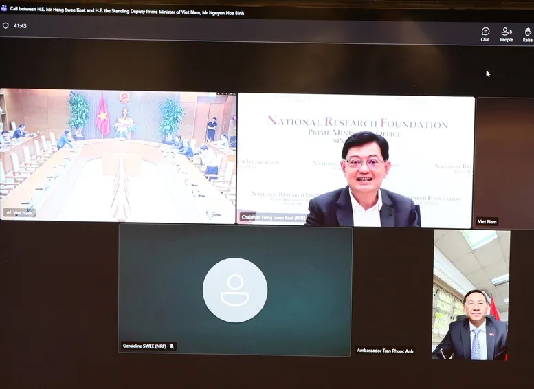 Ph&oacute; Thủ tướng Thường trực Nguyễn H&ograve;a B&igrave;nh điện đ&agrave;m với nguy&ecirc;n Ph&oacute; Thủ tướng Singapore Vương Thụy Kiệt - Ảnh 2.