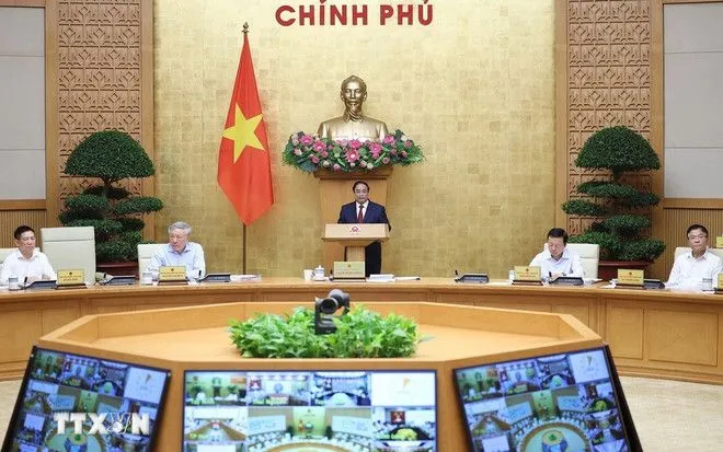 Thủ tướng Phạm Minh Chính chủ trì Phiên họp Chính phủ thường kỳ tháng 3 năm 2026 và Hội nghị Chính phủ trực tuyến với địa phương. (Ảnh: Dương Giang/TTXVN)