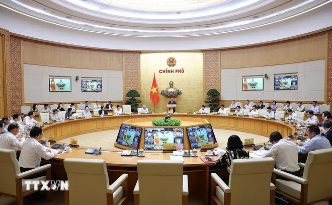 Thủ tướng Phạm Minh Ch&iacute;nh: Vượt qua nhiều &ldquo;cơn gi&oacute; ngược&rdquo;, đưa &ldquo;con thuyền&rdquo; kinh tế, x&atilde; hội cập bến an to&agrave;n - Ảnh 2.