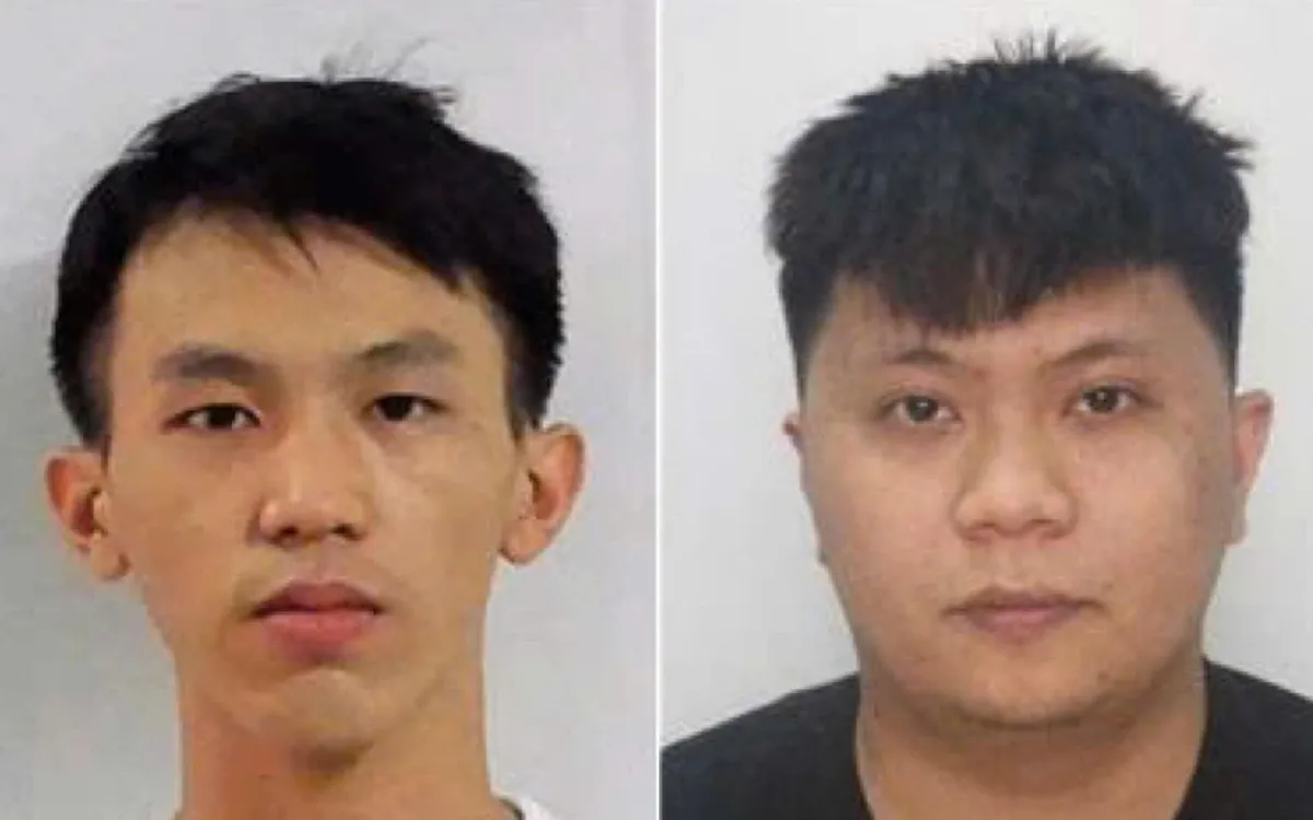 Đối tượng Trương Thanh Sĩ (bên trái) và Trần Anh Vương (bên phải) tại cơ quan Công an. (ảnh: CAND)