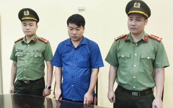 Phạm Quốc Dương tại cơ quan công an 