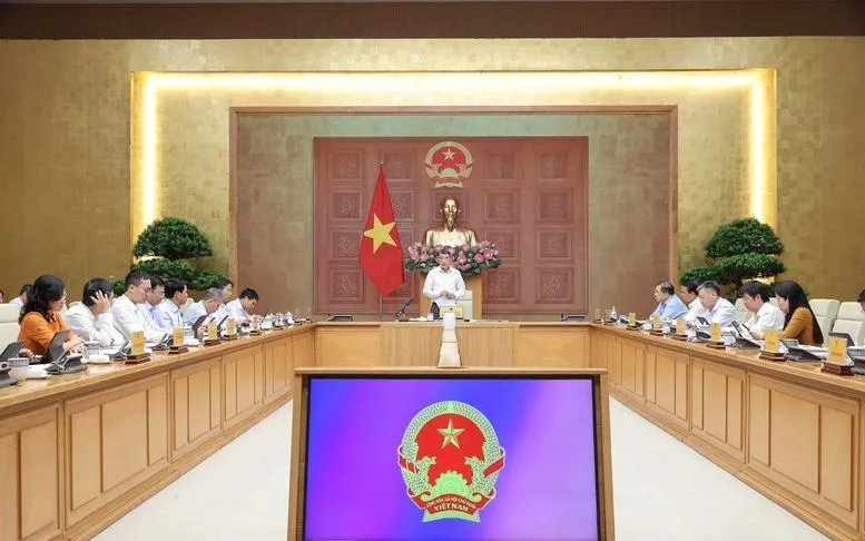 Thủ tướng Chính phủ Lê Minh Hưng chủ trì cuộc làm việc với Ngân hàng Nhà nước - Ảnh: VGP/Nhật Bắc