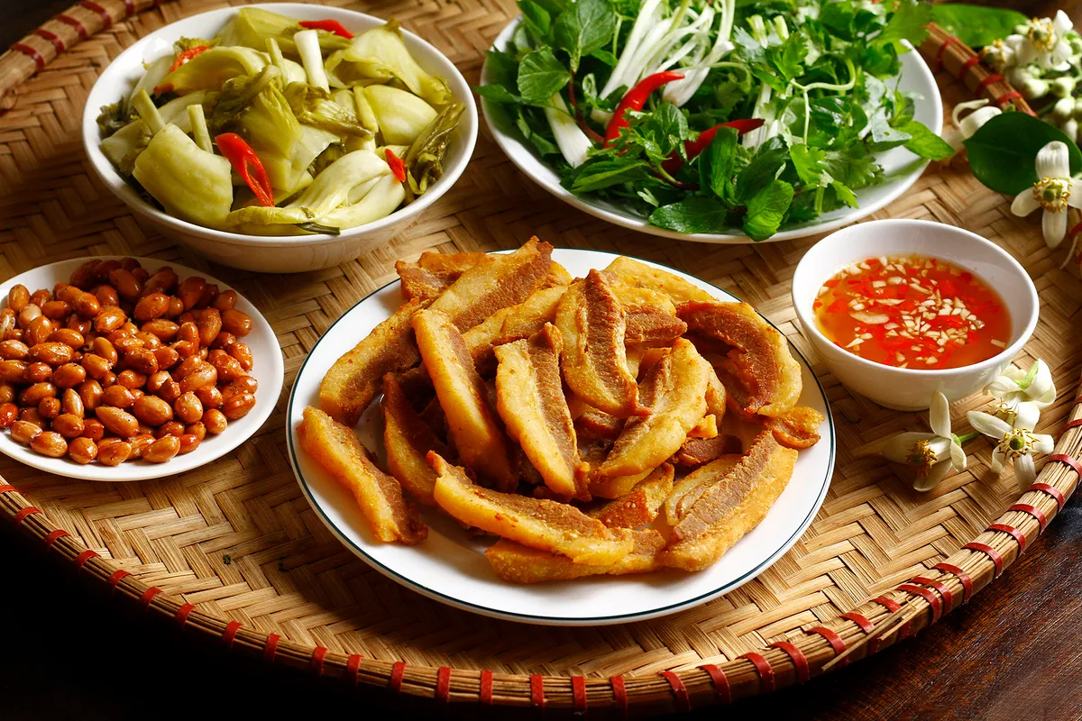 T&oacute;p mỡ &ndash; m&oacute;n ăn d&acirc;n d&atilde; "g&acirc;y nghiện": Ăn sao để kh&ocirc;ng hại sức khỏe?- Ảnh 1.