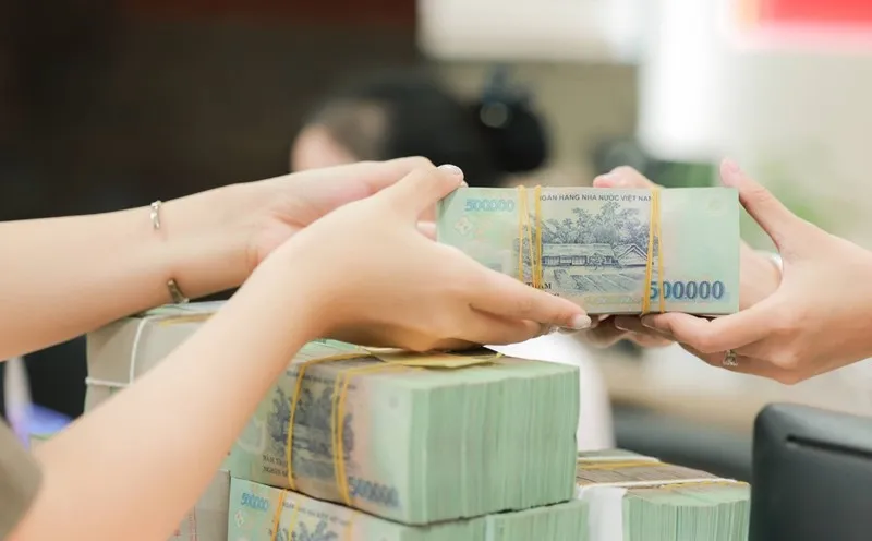 Bộ T&agrave;i ch&iacute;nh l&ecirc;n tiếng về quy định trả lương từ 5 triệu đồng phải chuyển khoản- Ảnh 1.