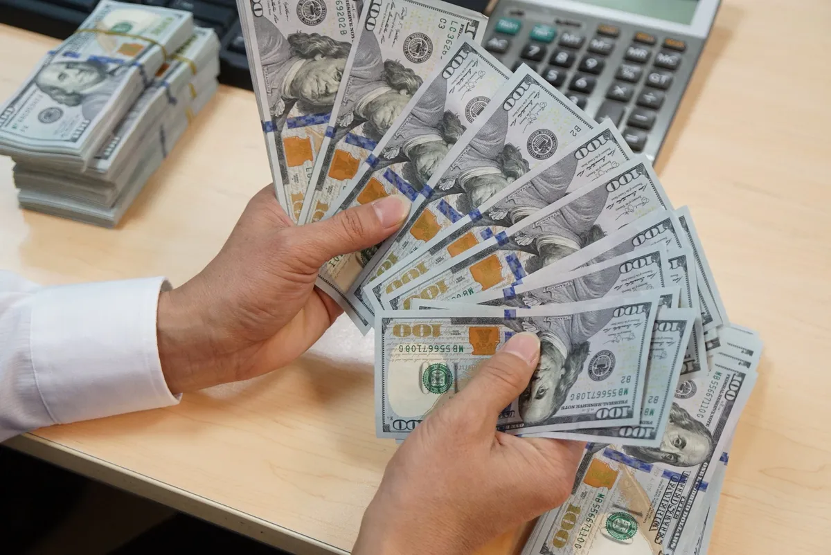 Ng&acirc;n h&agrave;ng đồng loạt giảm gi&aacute; USD v&agrave; nhiều ngoại tệ- Ảnh 1.